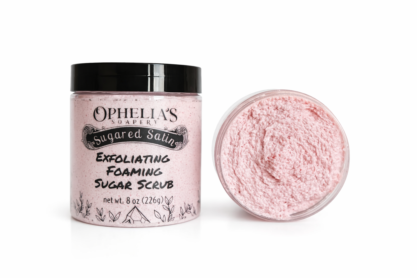 Ophelia's Sugarfry Exfoliating Foaming Sugar Scrub with a container and scoop of scrub on a white background