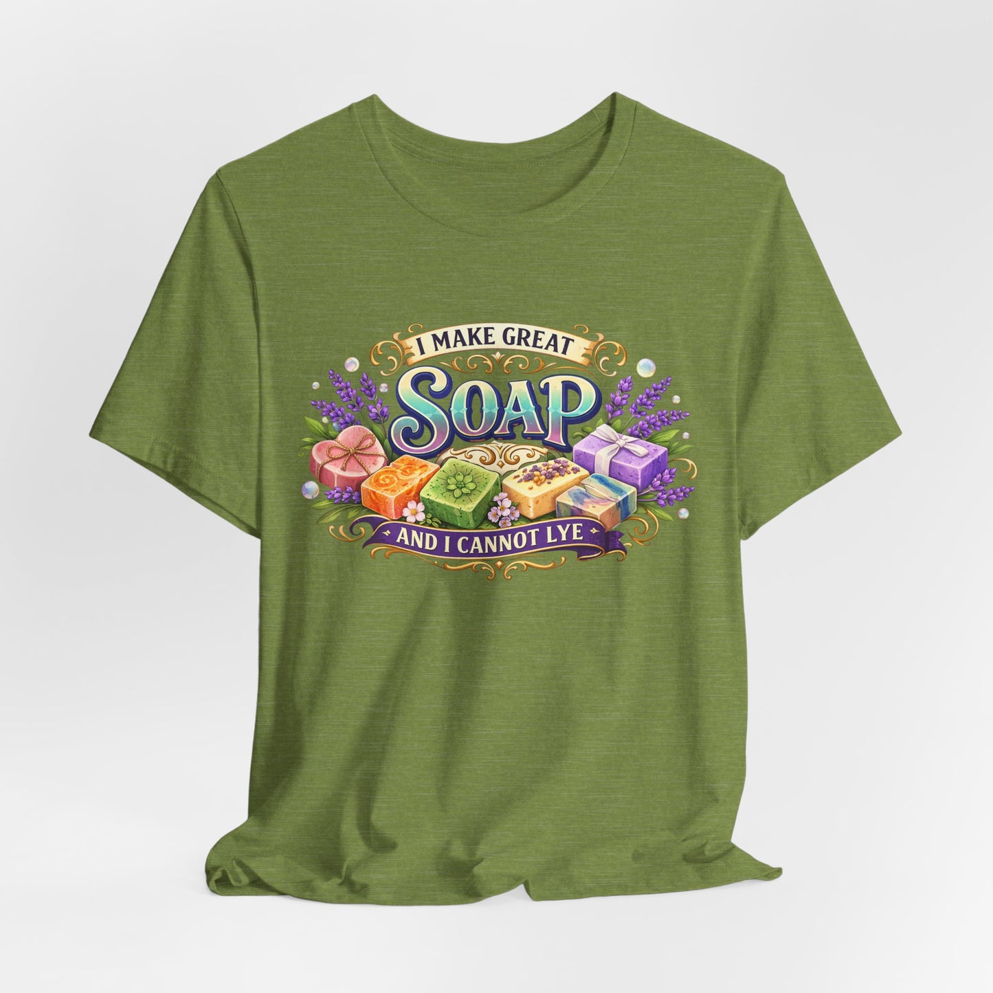 Olive-green t-shirt displays a colorful design of handmade soaps and lavender, stating "I make great soap and I cannot lye."
