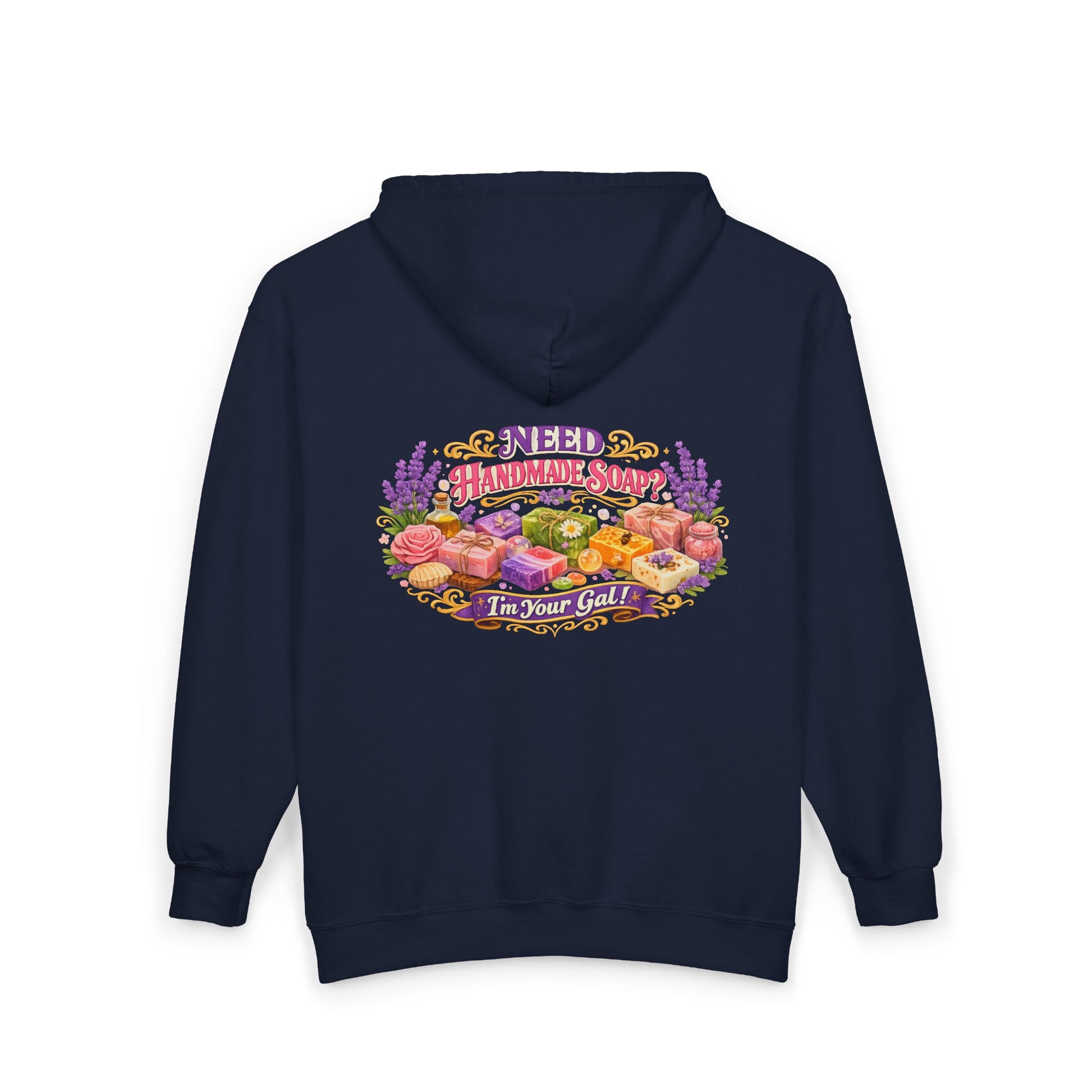 A navy hoodie displays a vibrant illustration promoting handmade soap with floral accents and the phrase "Need Handmade Soap? I'm Your Gal!".
