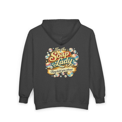 Black hoodie with colorful graphic a that says I’m the soap lady they told you about  on the back against a white background