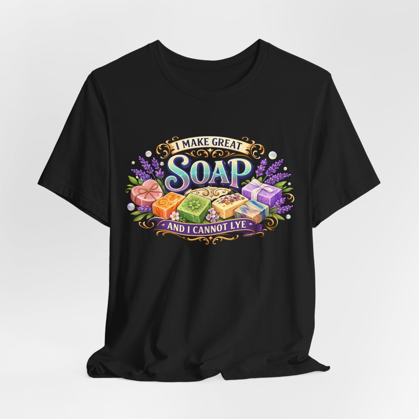 Black T-shirt displays a colorful graphic that says "I Make Great Soap And I Cannot Lye" surrounded by artisanal soaps and lavender.

