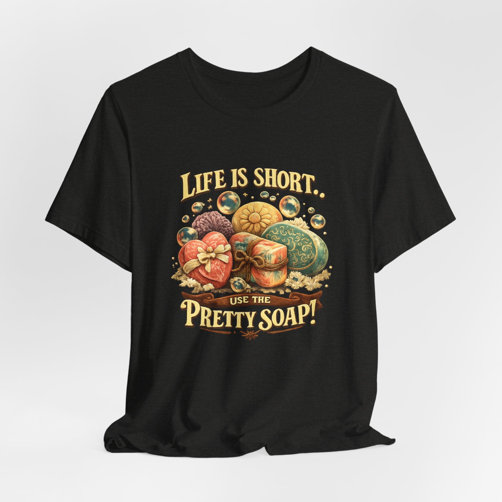 Black t-shirt with colorful soap graphic and text 'Life is Short, Use the Pretty Soap!' on a white background